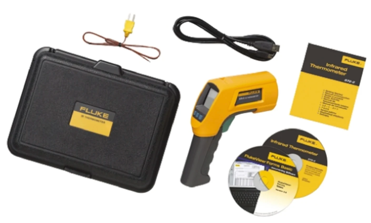 Fluke 572-2 infrared thermometer set with carrying case, probes, and manual on a white background