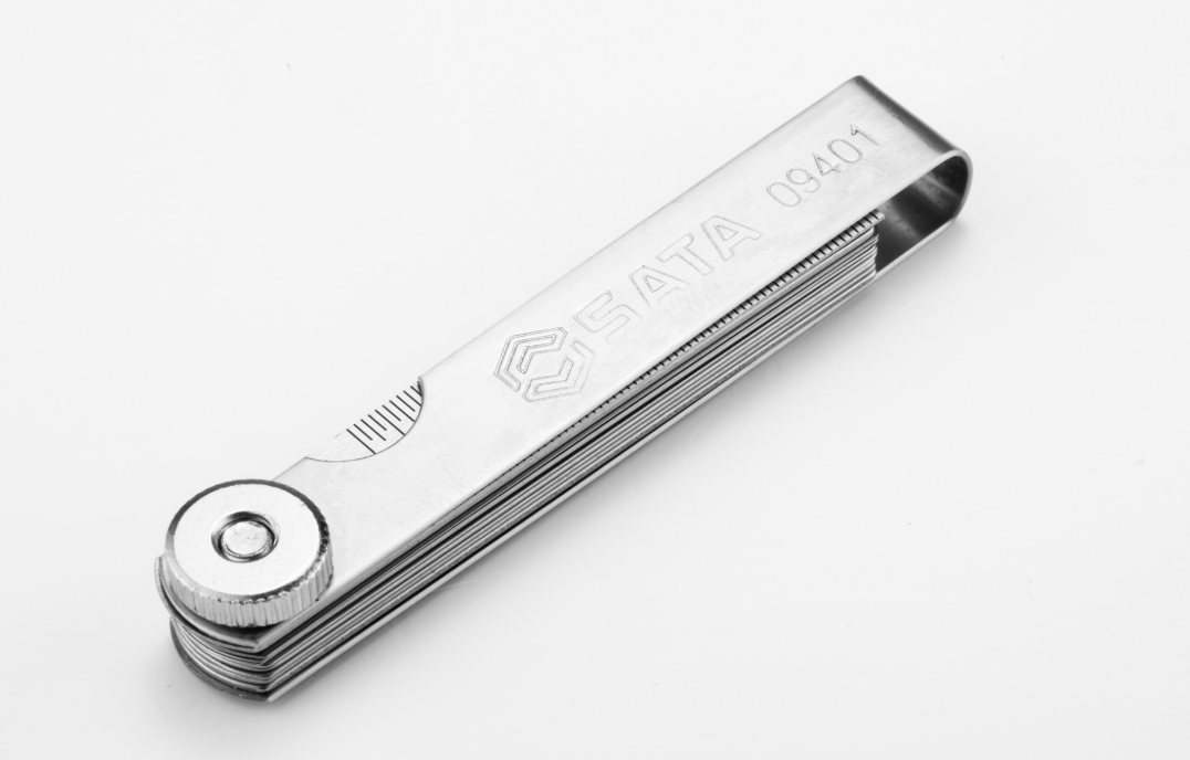 Shop the SATA 09401 14-Piece Feeler Gauge Set 0.05-1.00mm: Mn steel blades, polished finish, includes ruler. Precise gap measurement for mechanics.